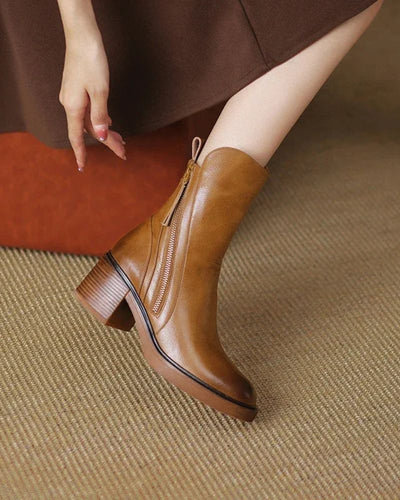 Valorine™ | Black leather boots with a comfortable heel, elegant and timeless